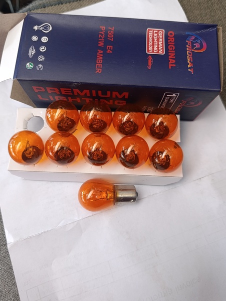 FOCO AMPOLLA 1CONT 12V ORIGINAL naranjado (puntos desigual en V) hilux